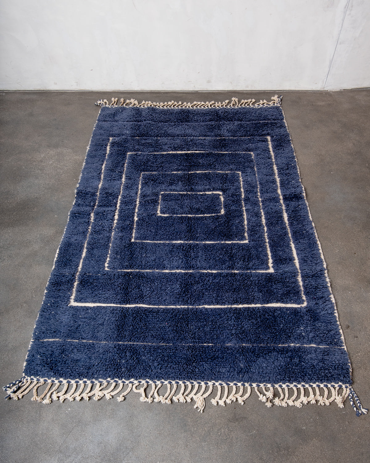 Modern, designer, handcrafted Berber rug from Morocco. Beniourain carpet with beautiful colours and patterns and fluffy wool texture.